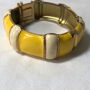 Yellow enamel bracelet with safety catch, cream , yellow and gold tone